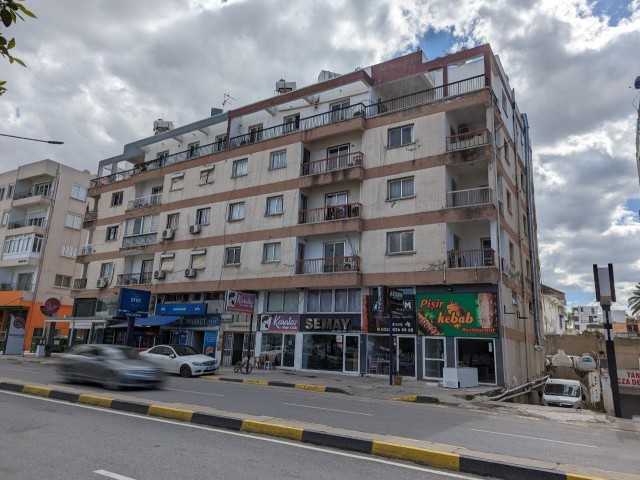 IN LEFKOŞA, ON BEDREDDİN DEMİREL STREET, ONE OF THE BUSIEST STREETS OF THE CITY AND IN A VERY CENTRAL LOCATION, BETWEEN MERİT HOTEL AND MINISTRIES, 140 SQUARE METERS (70 GROUND 