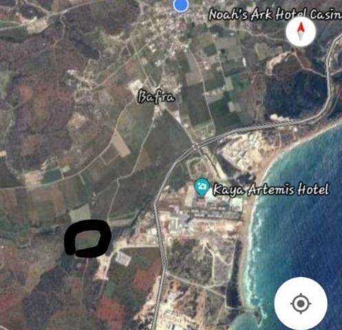 OUR 12-ACRE LAND OPEN FOR CONSTRUCTION WITH SEA VIEWS IN A MAGNIFICENT LOCATION OPPOSITE THE ROCK ARTEMIS IN THE ISKELE BAFRA DISTRICT IS FOR SALE AT 150.000 GBP REF 1012 ** 