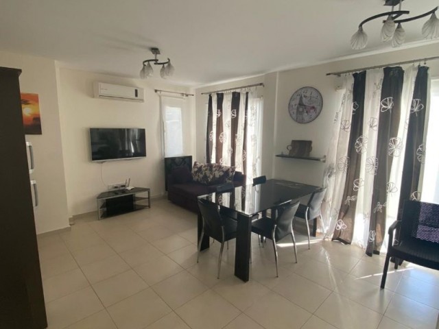 2+1 apartment with a fully furnished large garden on the Caesar Beach of Iskele-Bosphorus from Ozkaraman (all taxes have been paid) ** 