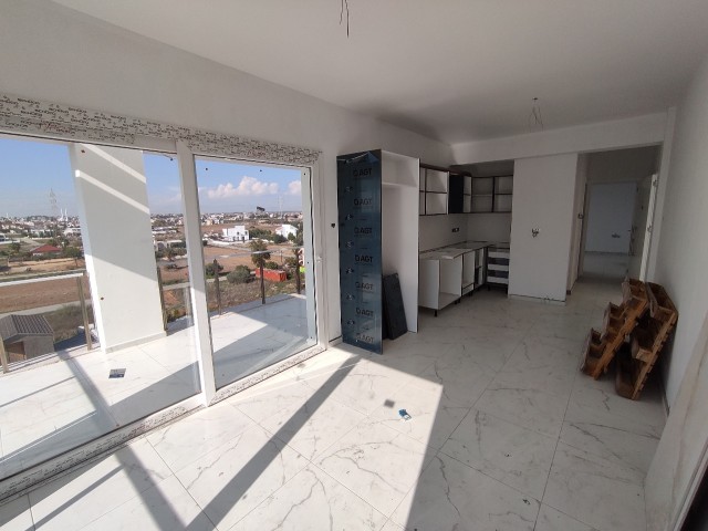 Zu verkaufen in Özkaraman dan Yenibogazici, 3 + 1 Loft-Wohnung mit Terrasse (letzte Wohnung zum Verkauf) ** 