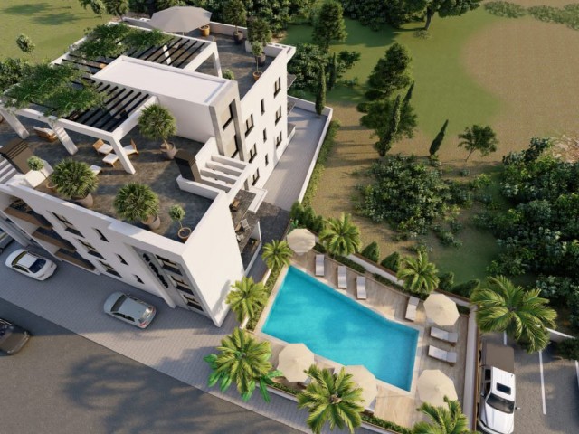 2 + 1 LUXURY APARTMENTS FOR SALE WITH MOUNTAIN AND SEA VIEWS, ON A SITE WITH A POOL IN THE CENTER OF