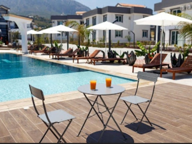 1+1 Wohnung zu verkaufen in einer eleganten Anlage mit Pool in der Region GIRNE &KARAOGLANOGLUOGLU
