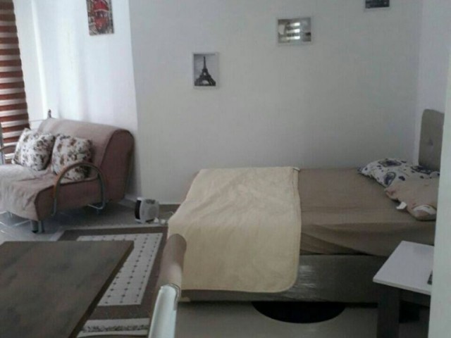 ALSANCAK, A STUDIO APARTMENT WITH FULL FURNITURE AND COMMUNAL SWIMMING POOL