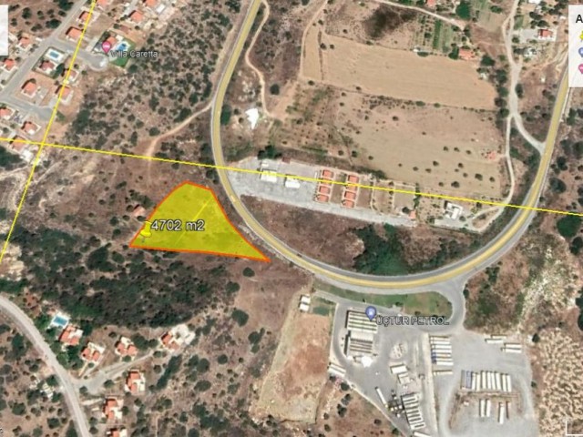 Продается земельный участок площадью 4702 м2 в городе Кирения-Эсентепе с многочисленными початками. ** 