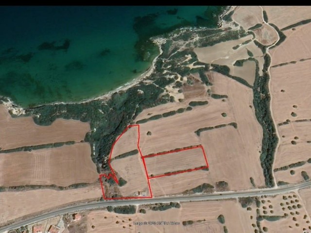  14 acres, investment property in Yeni Erenköy, a magnificent land by the sea with its own bay. with the way